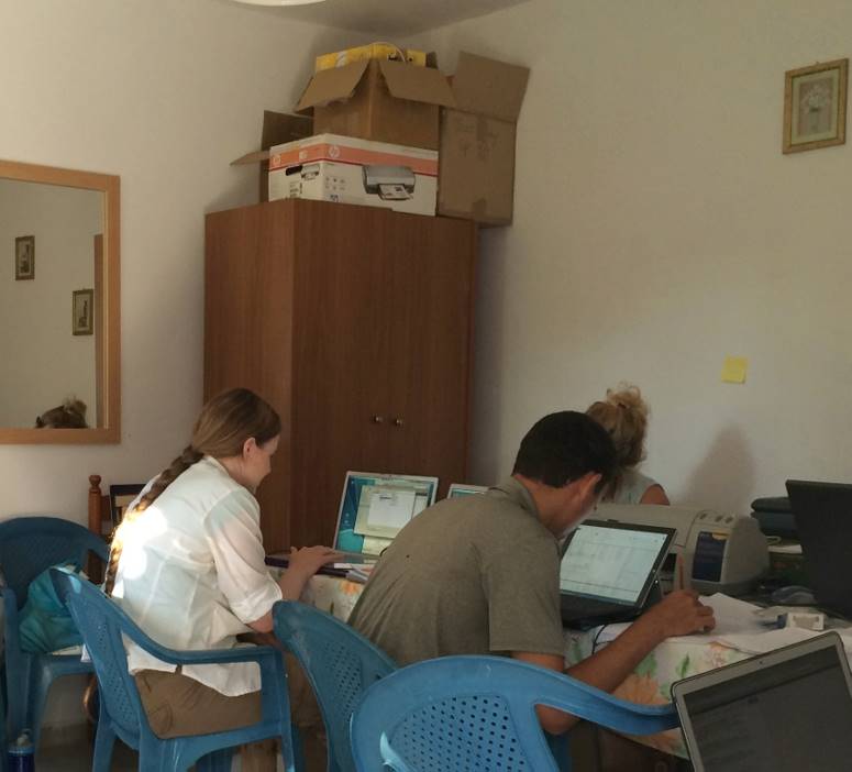 A. Green, J. Mundy, and D. Majarwitz working on Samothrace research, Photograph by Dr. Bonna Wescoat, 2015.